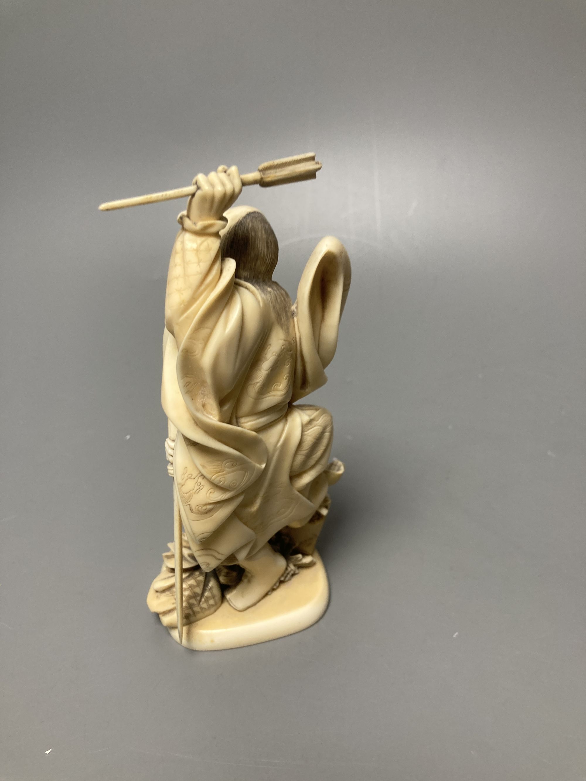 A Japanese ivory figure of a warrior, 19th century, height 16cm